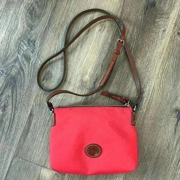 Dooney & Bourke Handbags - Dooney and Bourke Red Nylon Crossbody Leather Strap & zipper pull w/long strap